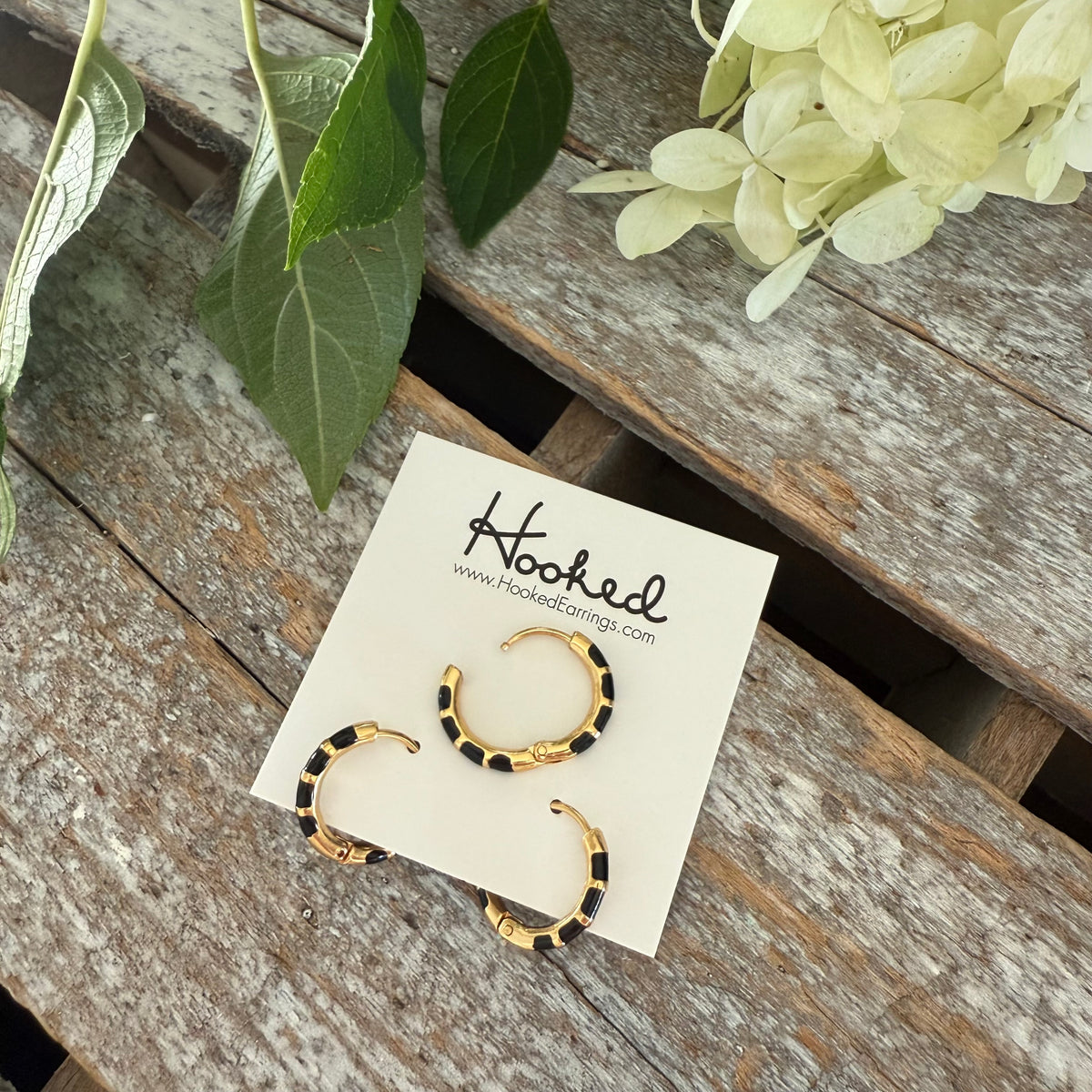 Striped Huggie Hoop Earrings - Black and Gold